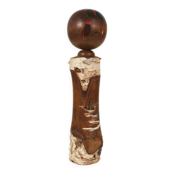 Decorative Kokeshi doll sculpture from northern Japan, hand-painted.