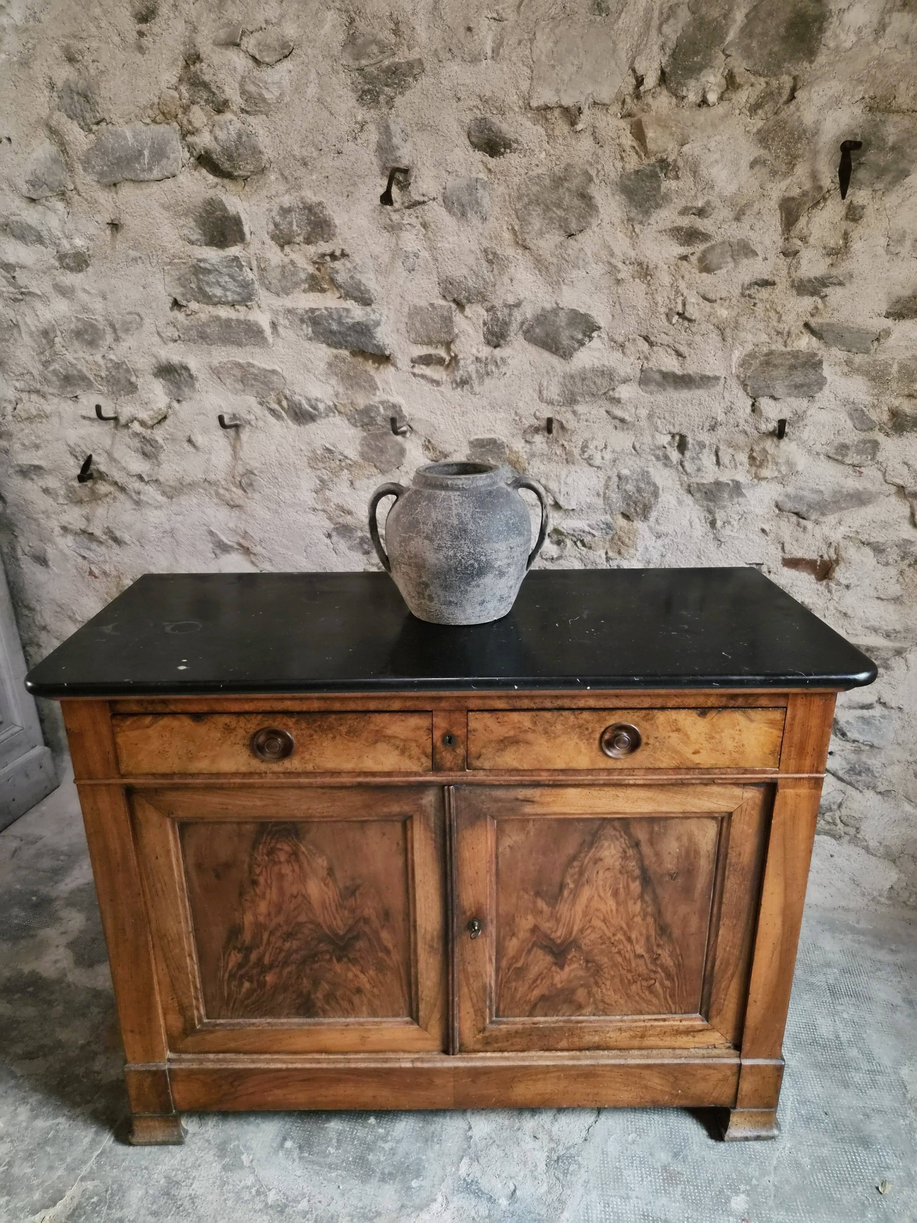 French Louis Philippe walnut buffet with black marble top, France, circa 1840–1860.