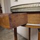 Louis XVI style bouillotte table in mahogany with a grey marble top.
