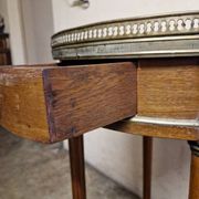 Louis XVI style bouillotte table in mahogany with a grey marble top.