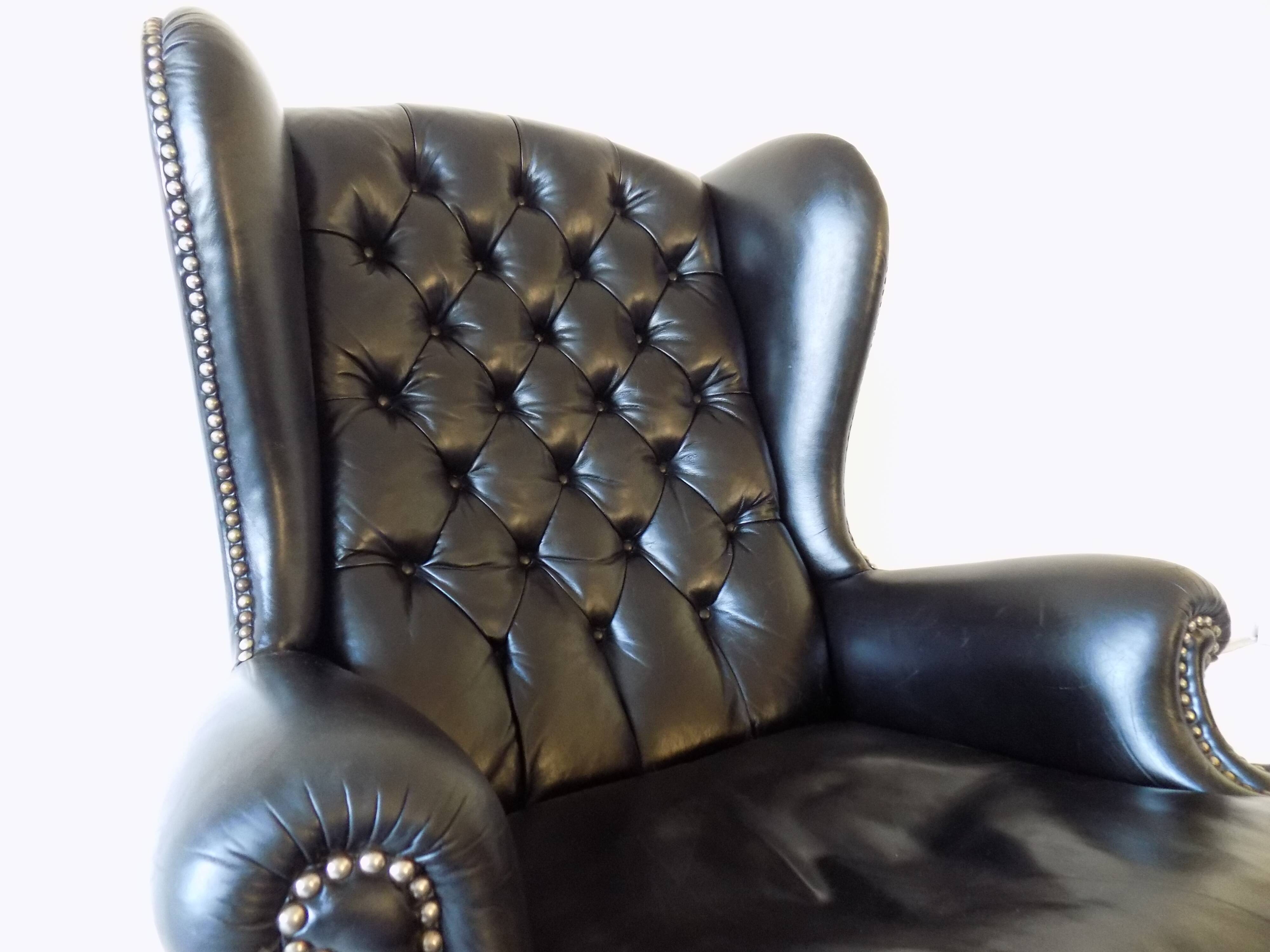 Chesterfield high back leather armchair black from the 1960s
