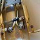 Pair of brass and smoked glass wall lights