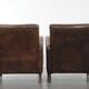 Set of two vintage sheepskin leather design armchairs in a cognac colour