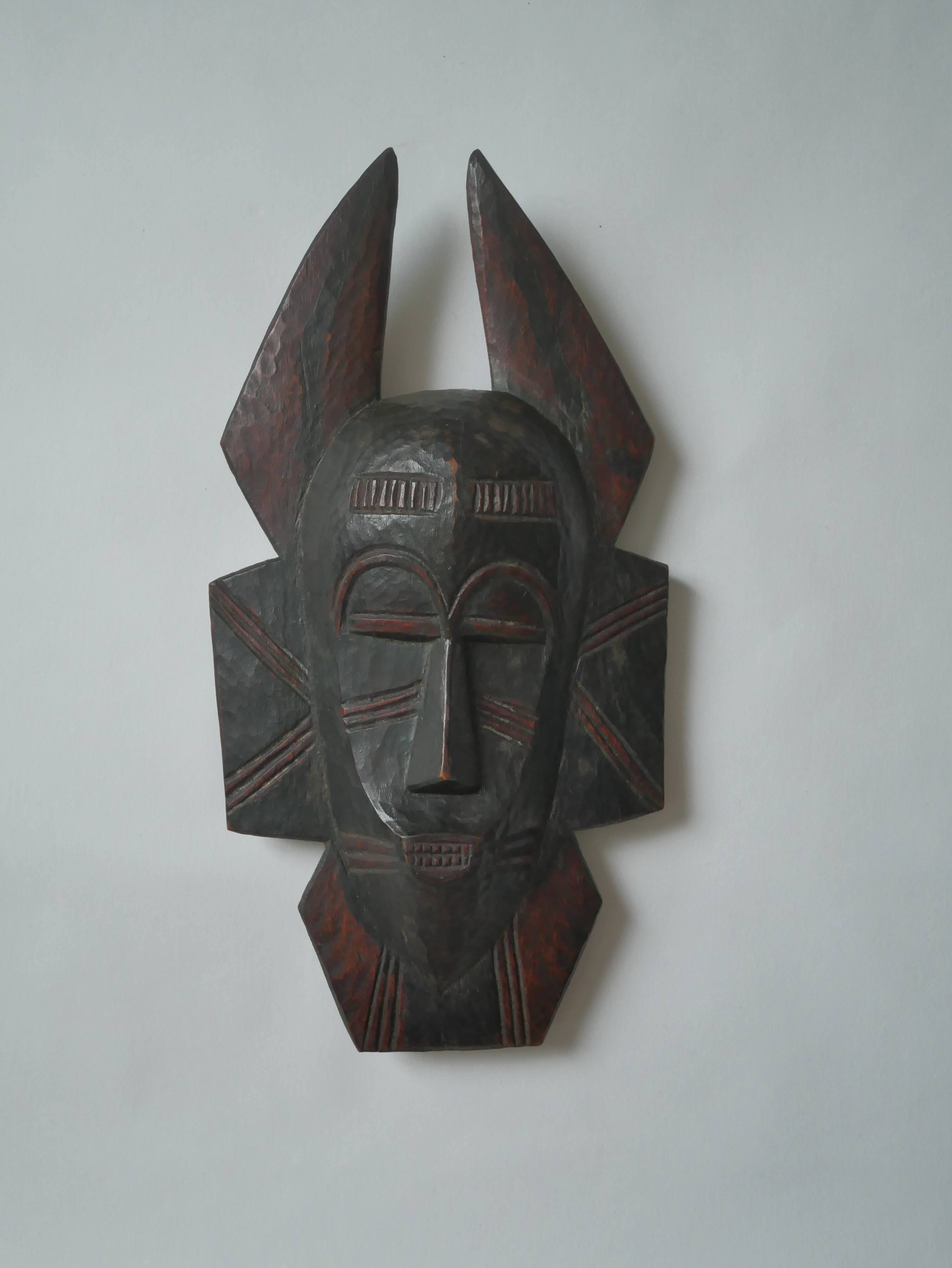 Carved wooden mask African art tribal decoration