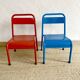 Pair of Mullca nursery chairs in metal and wood painted red and blue