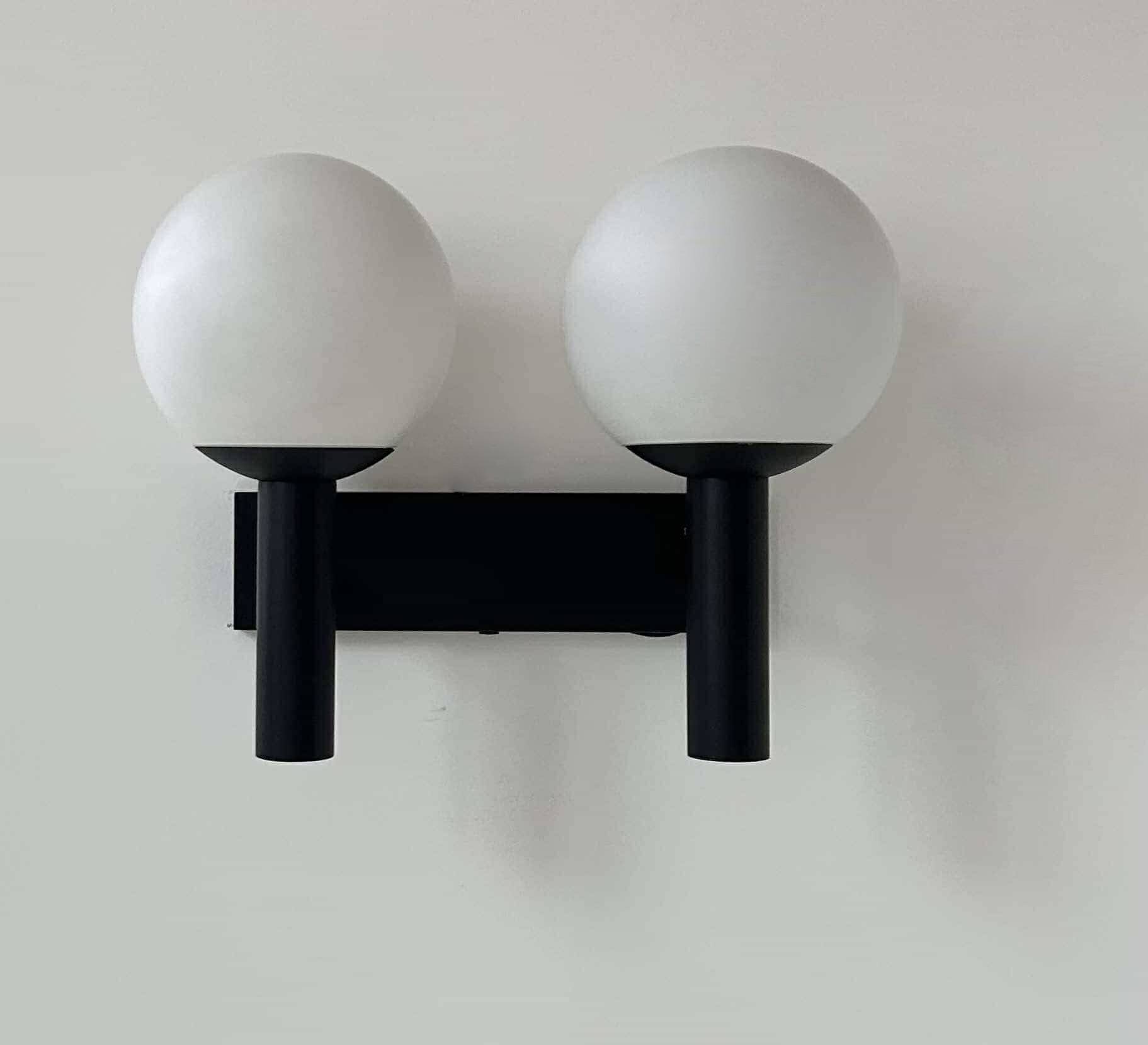 Vintage double wall lamp, opaline and black lacquered metal, Raak Netherlands 1960