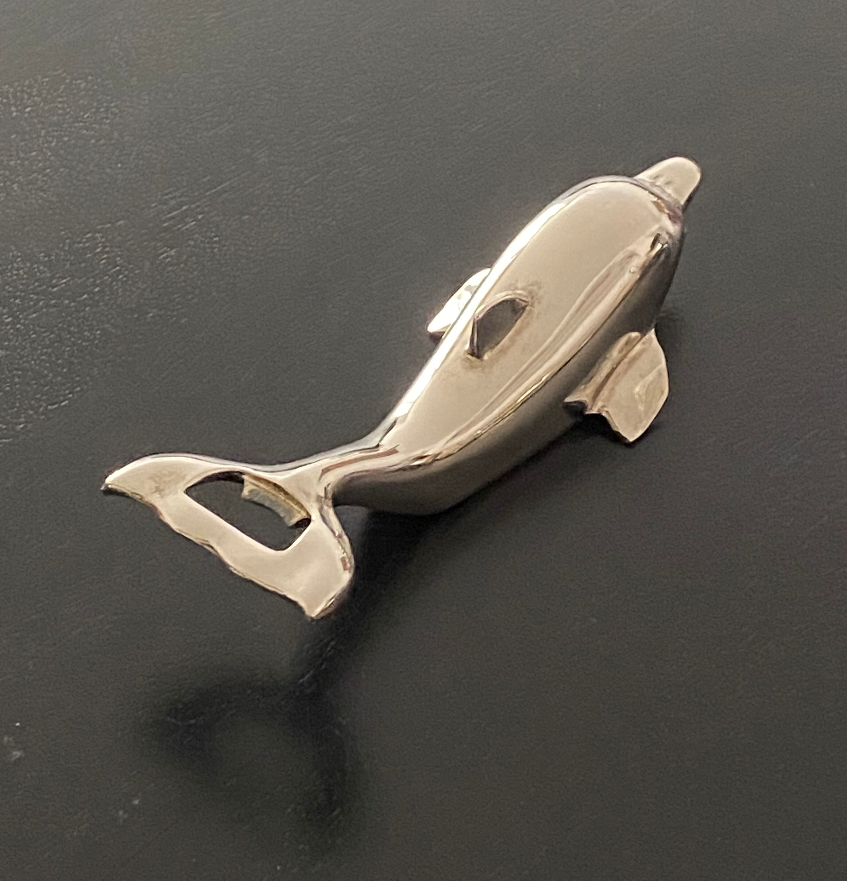 Bottle opener dolphin shape