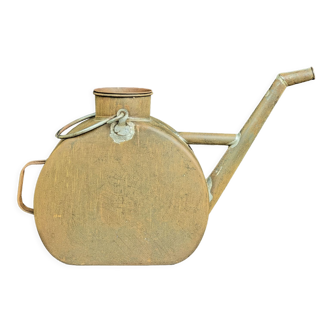 Former industrial watering can