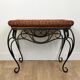 Rattan and wrought iron coffee table