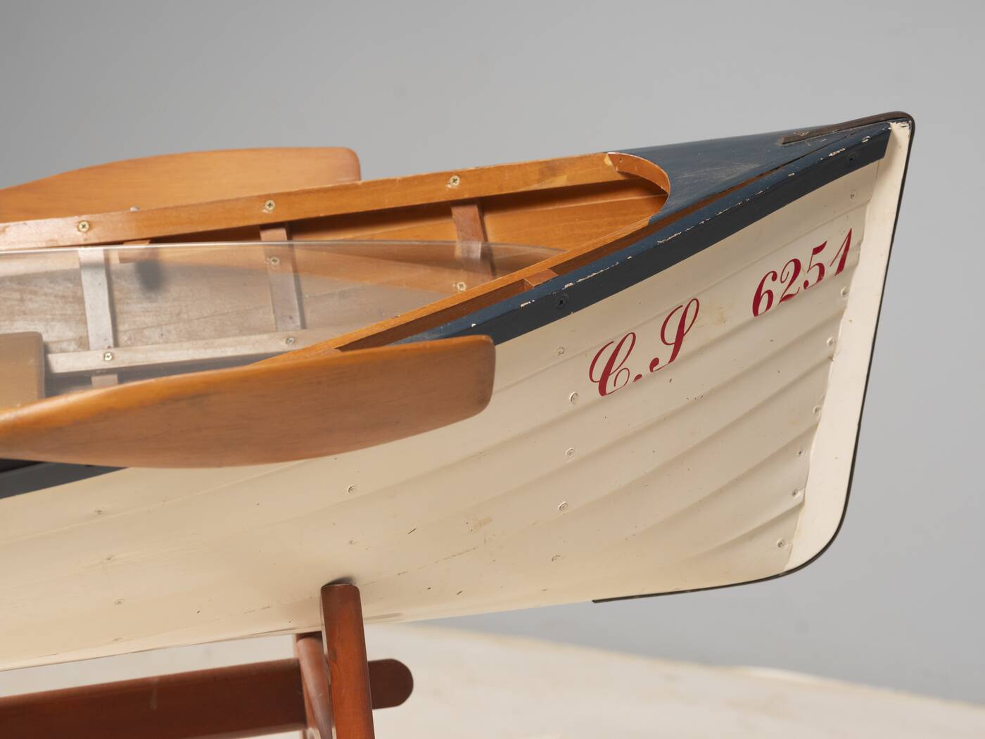 Boat-shaped coffee table reimagined with a glass top, contemporary design (after 2000)