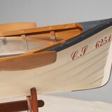 Boat-shaped coffee table reimagined with a glass top, contemporary design (after 2000)