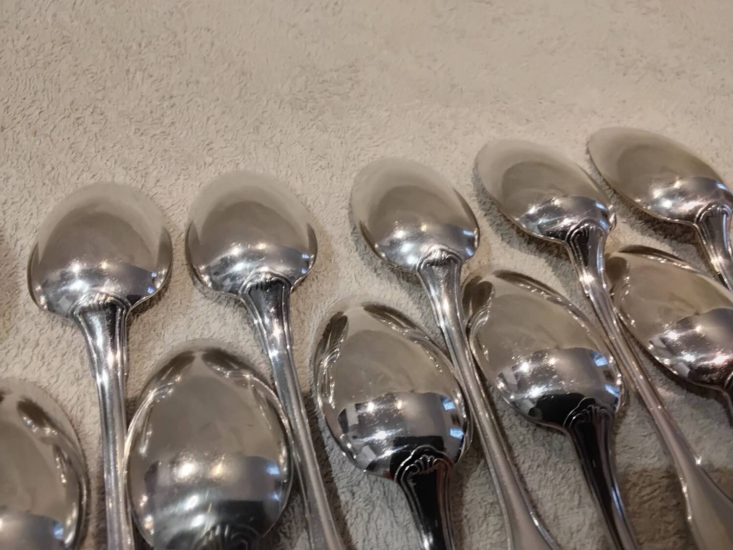 11 silver plated dessert spoons, Christofle Vendome, 17.1 cm
