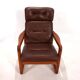 Fauteuil en cuir teck EMC, 1960