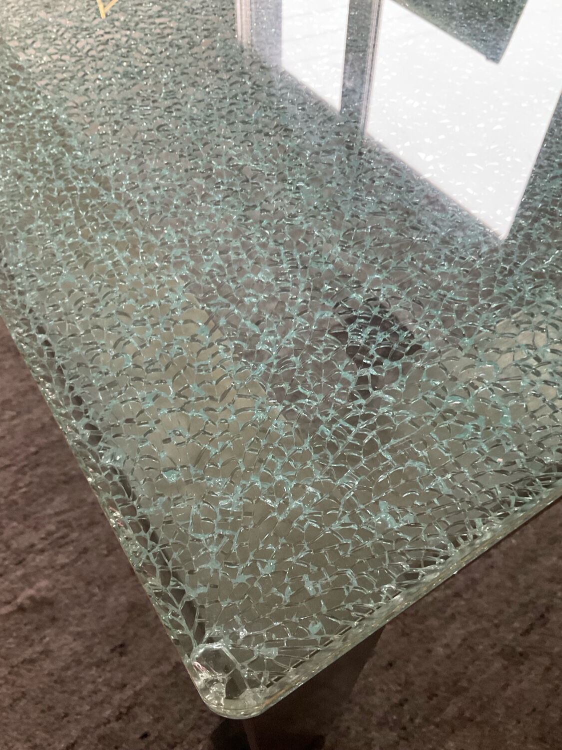 Designer garden coffee table in tempered glass and stainless steel