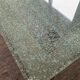 Designer garden coffee table in tempered glass and stainless steel