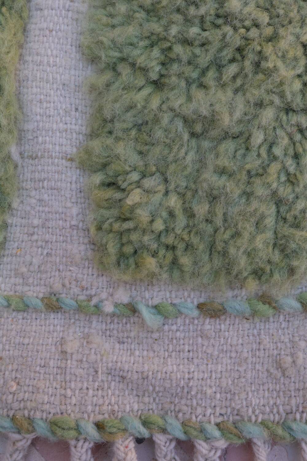 Almond green and blue green Moroccan rug with modern reliefs