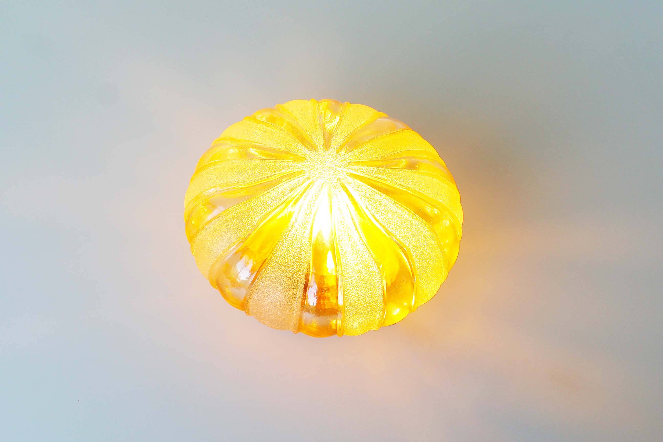 Vintage amber glass wall lamp by Wila Leuchten, Germany 1970's