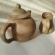 Teapot and small earthenware pot