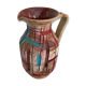 Former beige ceramic pitcher