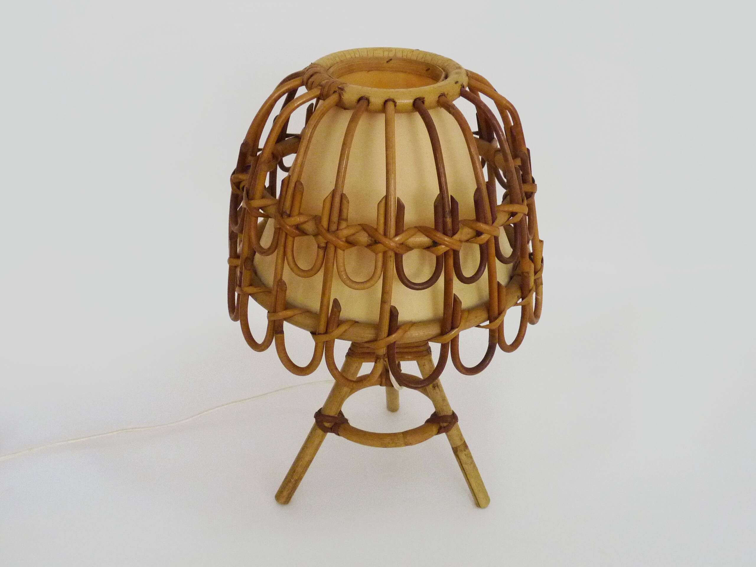 Rattan lamp in the style of Louis Sognot from the 1950s.