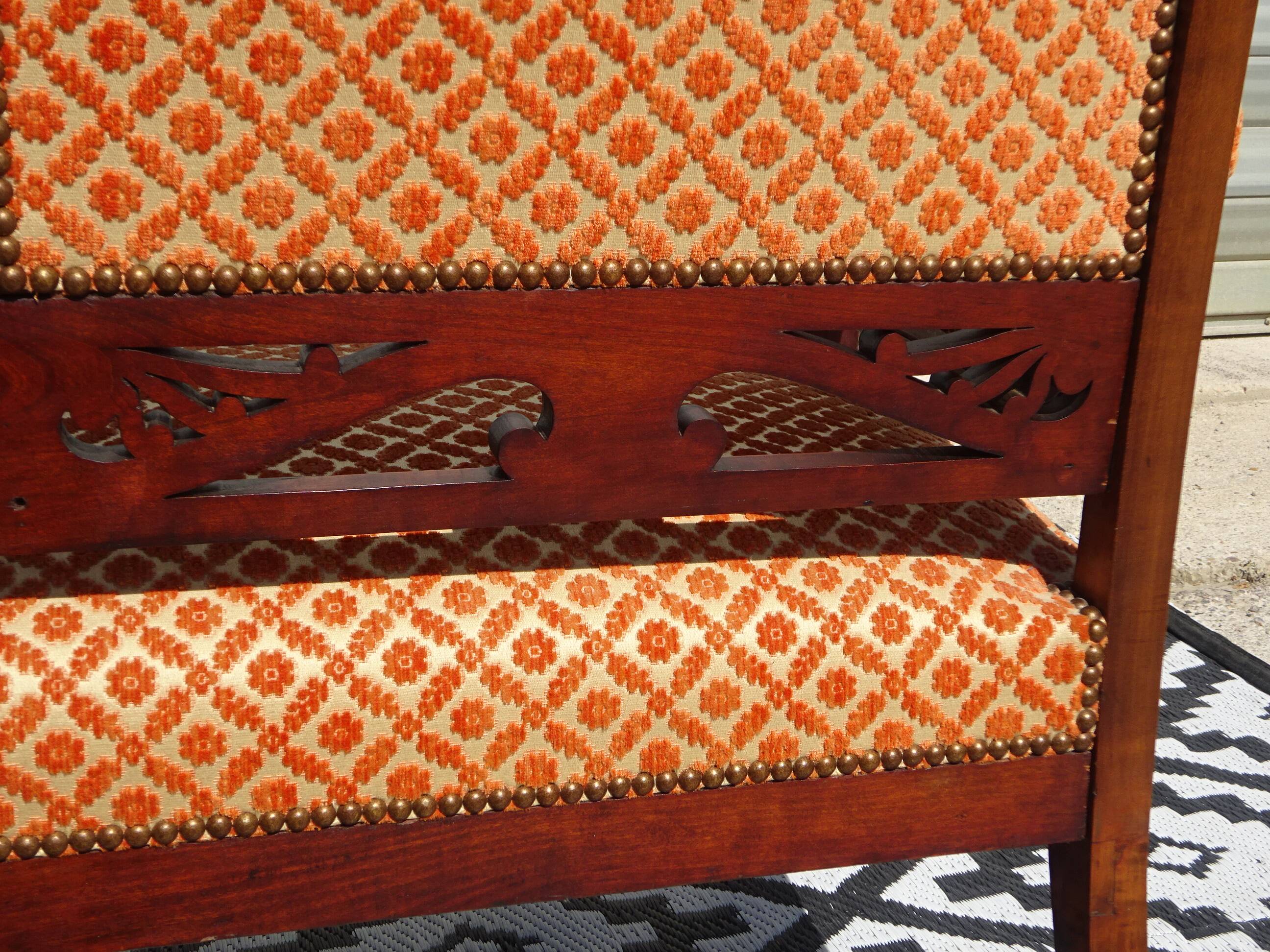 Vintage bench in wood and orange/ivory velvet.