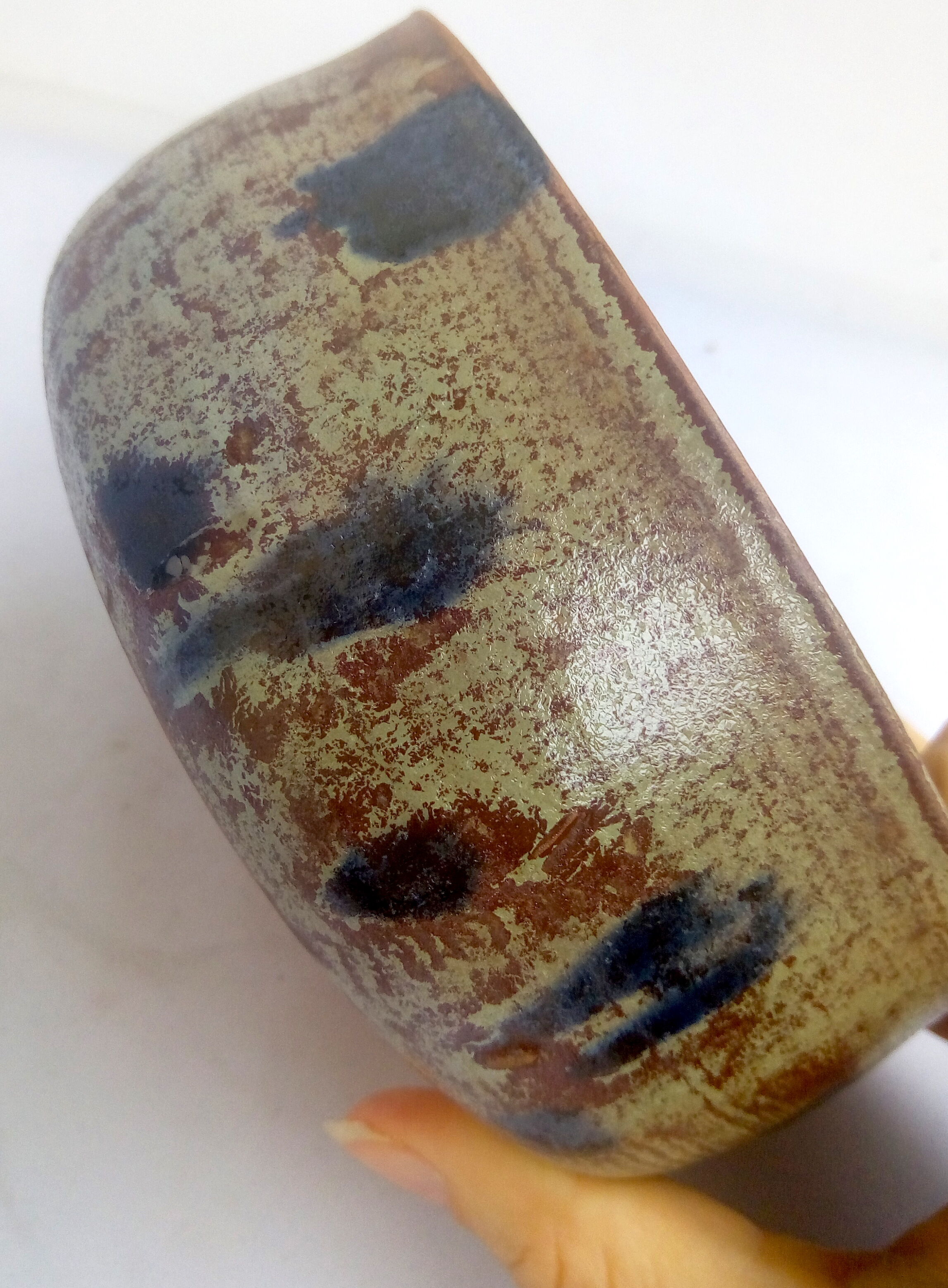 Rustic blue-spotted sandstone bowl