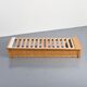 Banquette-lit dessinée par Charlotte Perriand pour Les Arcs, circa 1970.