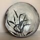 Large signed ceramic catchall.