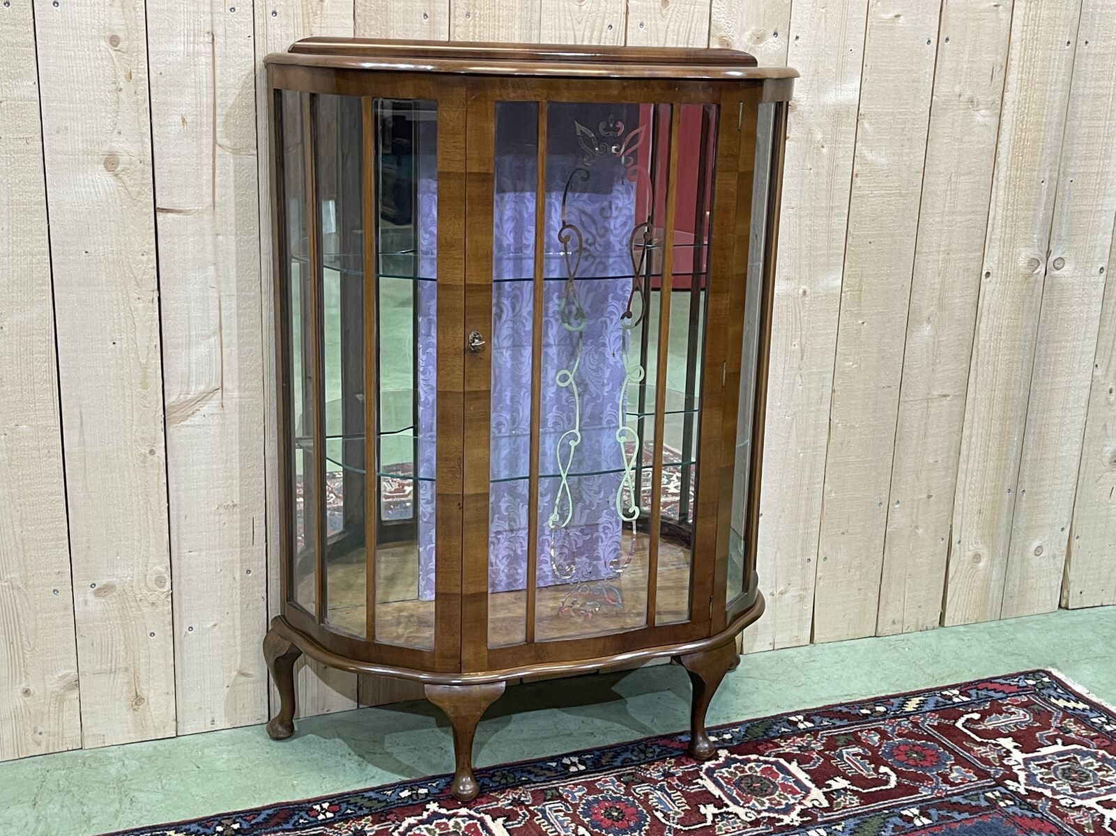 English walnut showcase from the 1930s