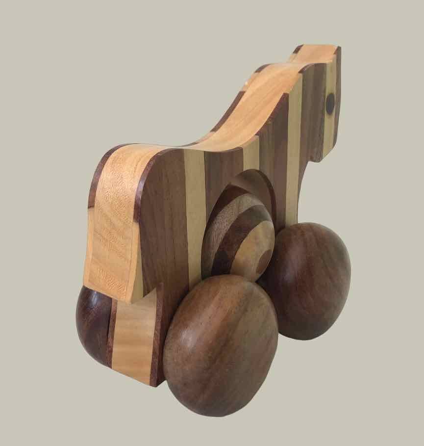 Small marquetry horse on wheels