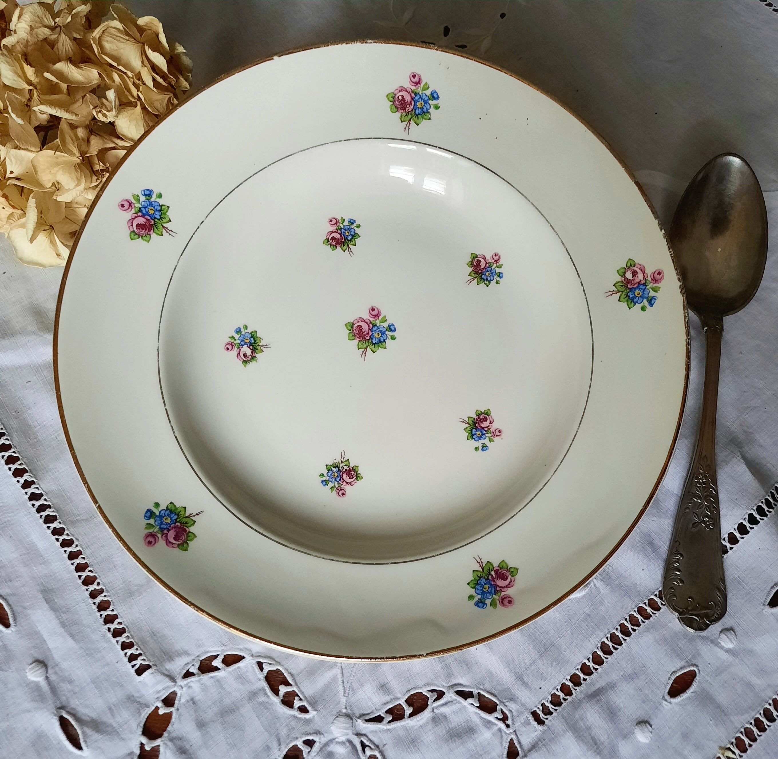 Old hollow plates mismatched in earthenware