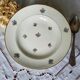 Old hollow plates mismatched in earthenware