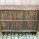 Vintage silk bank Lyonnais buffet with sliding wooden doors.
