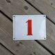 Enamelled metal plate street number