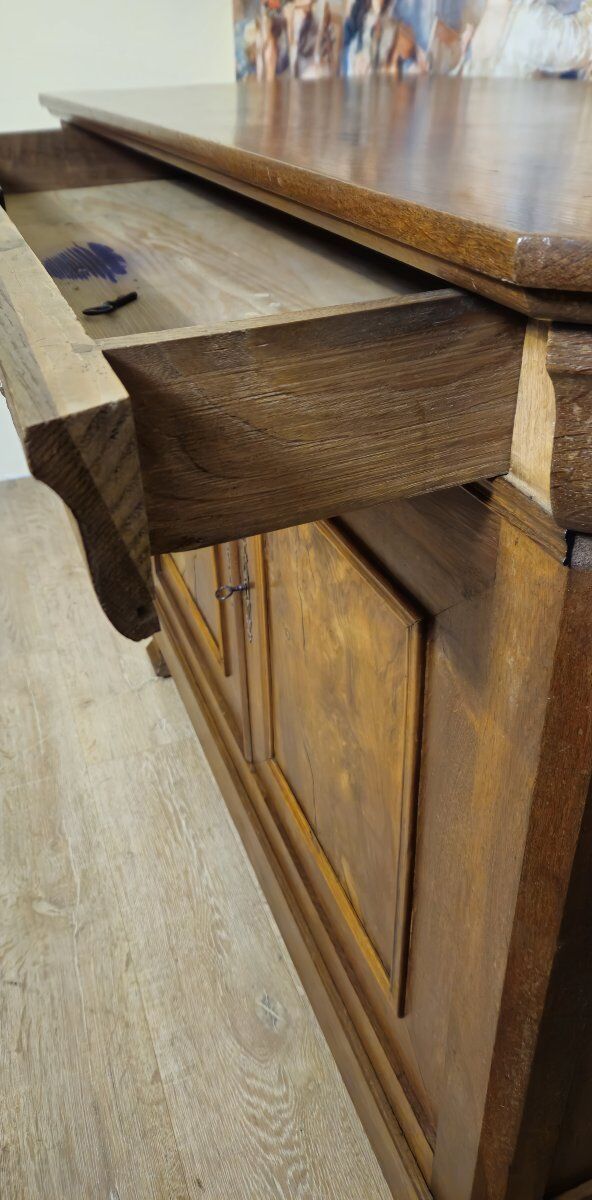Low buffet with a curved front from the Louis Philippe period in walnut.