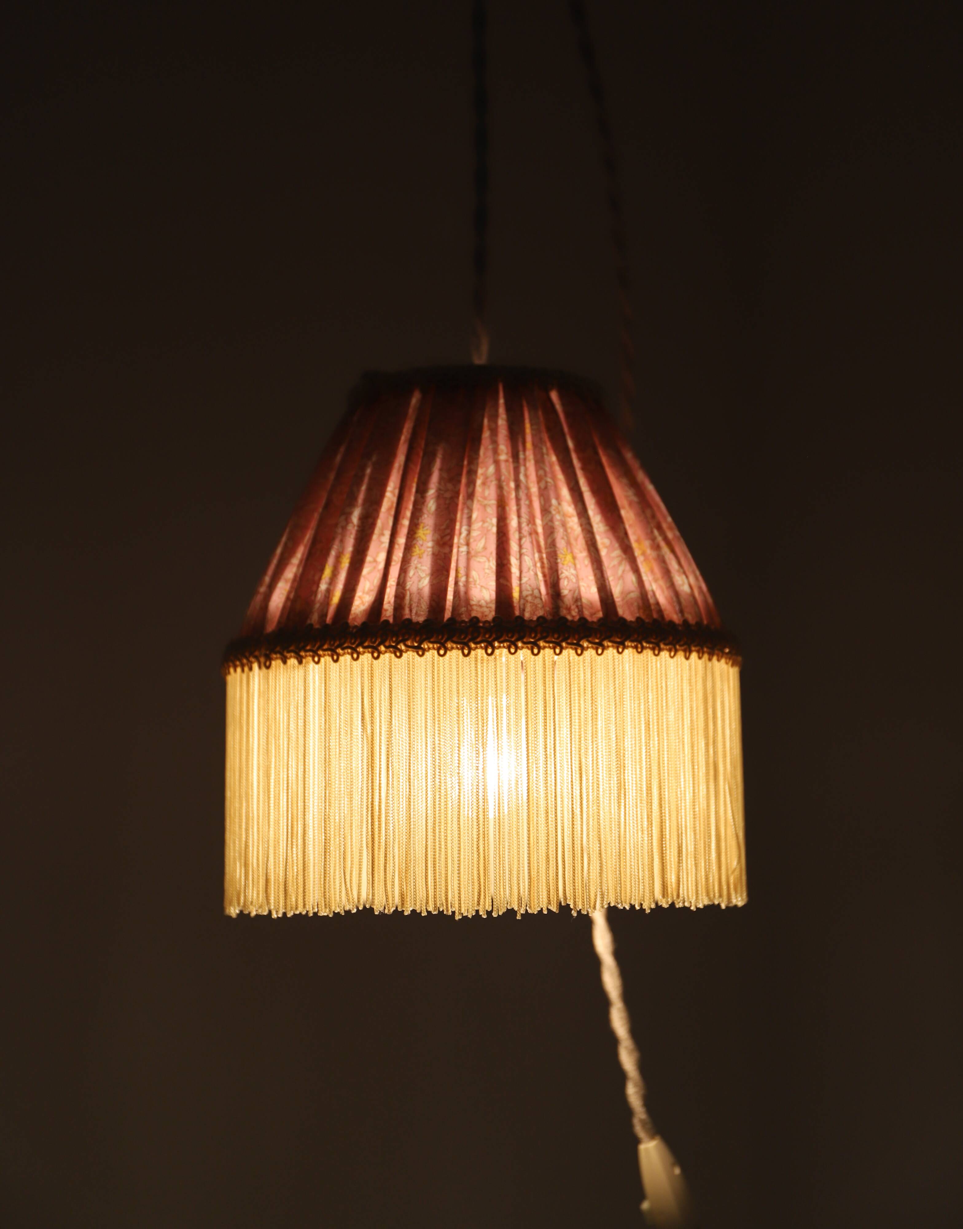Small floral portable lamp with fringed finish