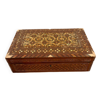 Old wooden and mother-of-pearl jewelry box