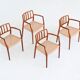 Niels Otto Moller model 66 armchairs teak and paper cord Denmark 1974