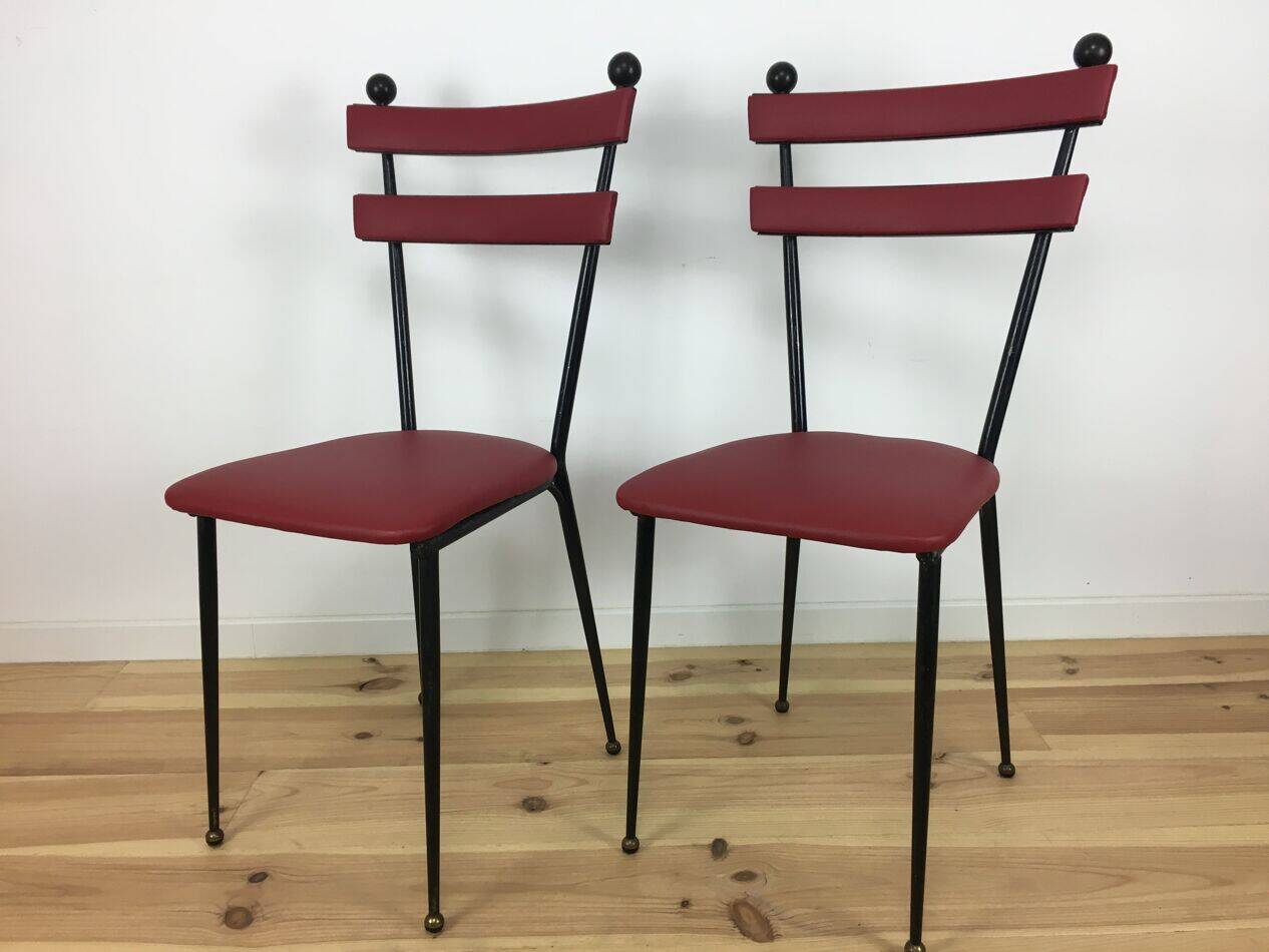 Pair of 1950s chairs in metal and red faux leather, Gueden-Adnet style.
