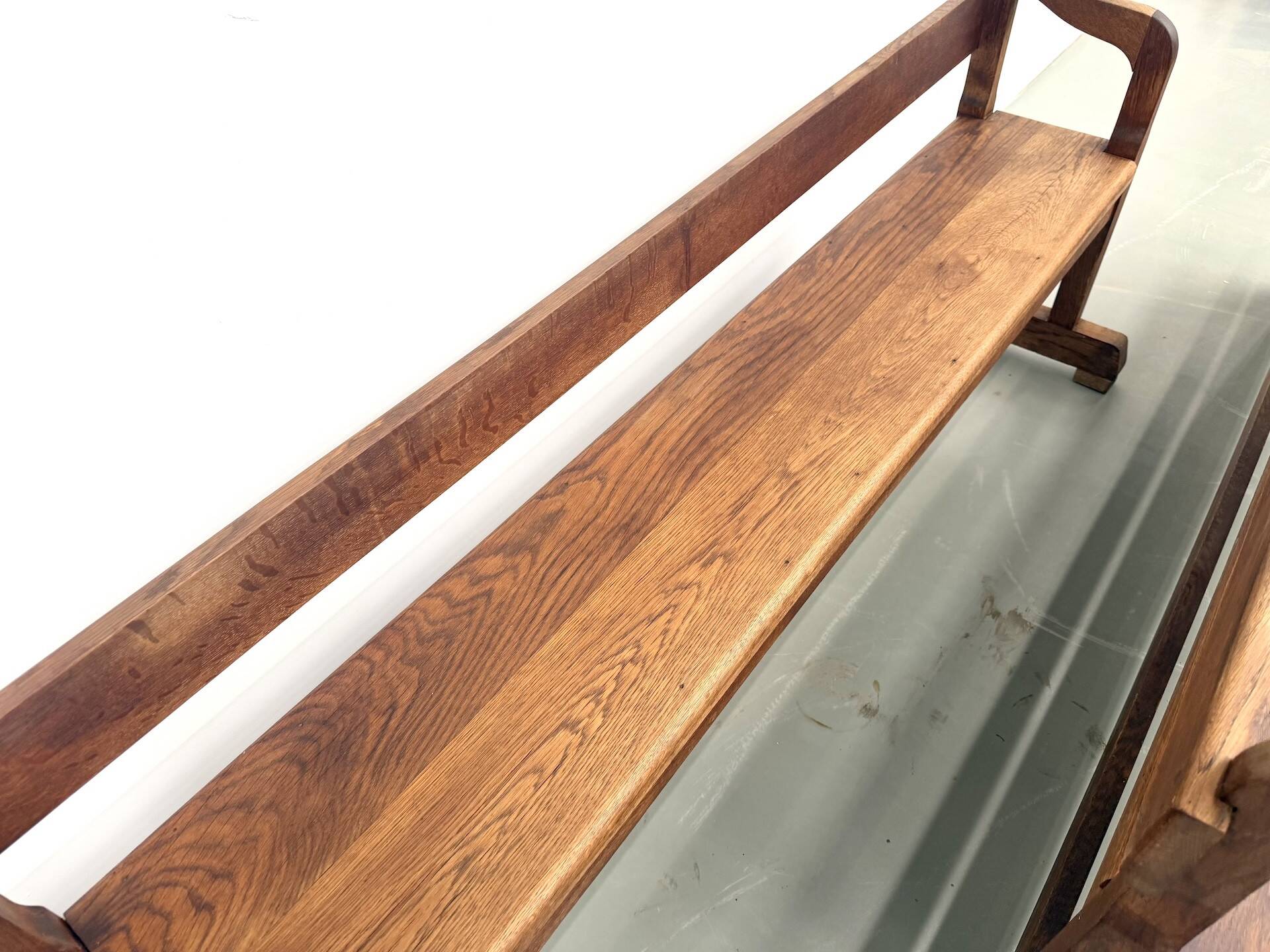 Pair of communal benches in solid oak, 1950s.