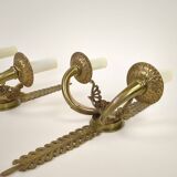 Pair of two-armed Empire wall sconces in gilded bronze
