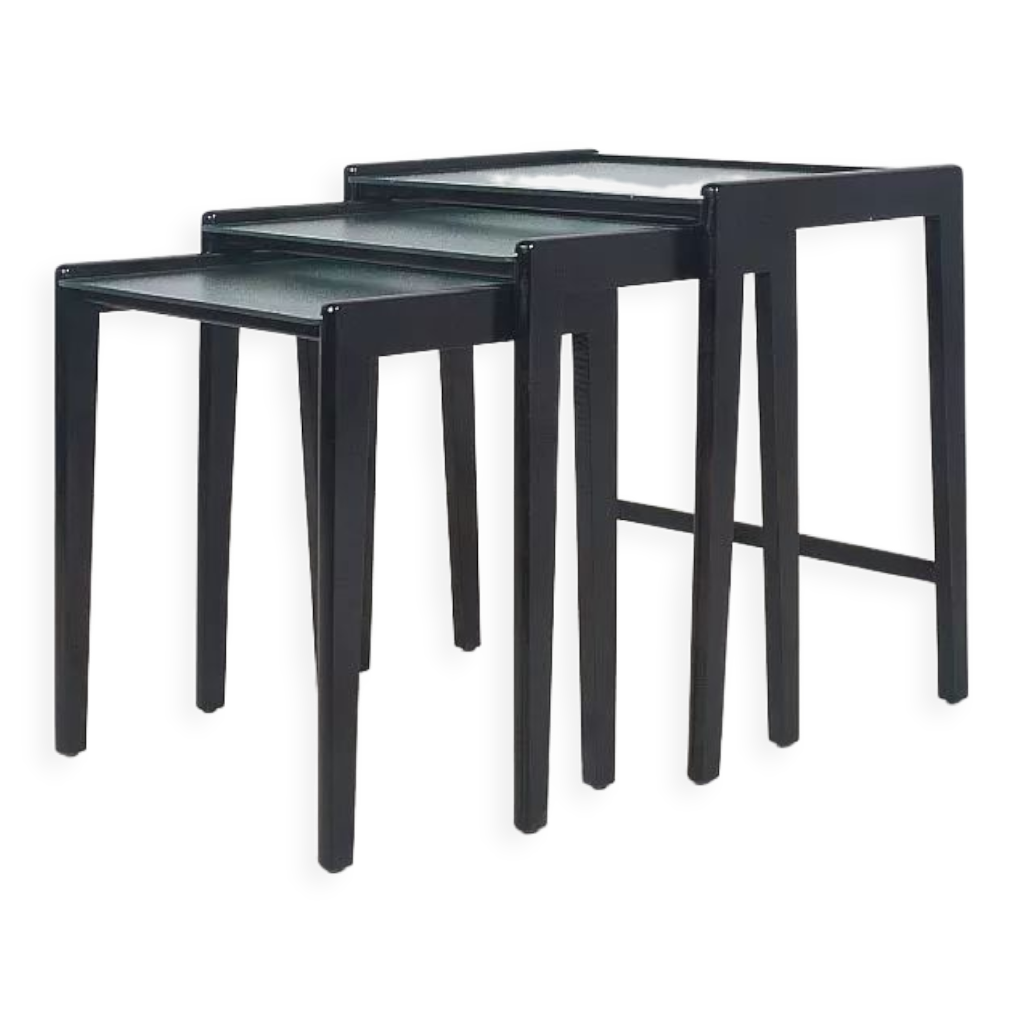 Tables gigognes en bois teinté noir et plateau en verre, années 1960