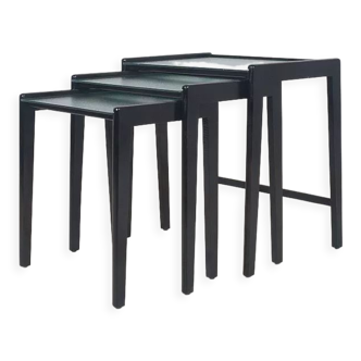 Set of nesting tables in black stained wood and glass top, 1960s