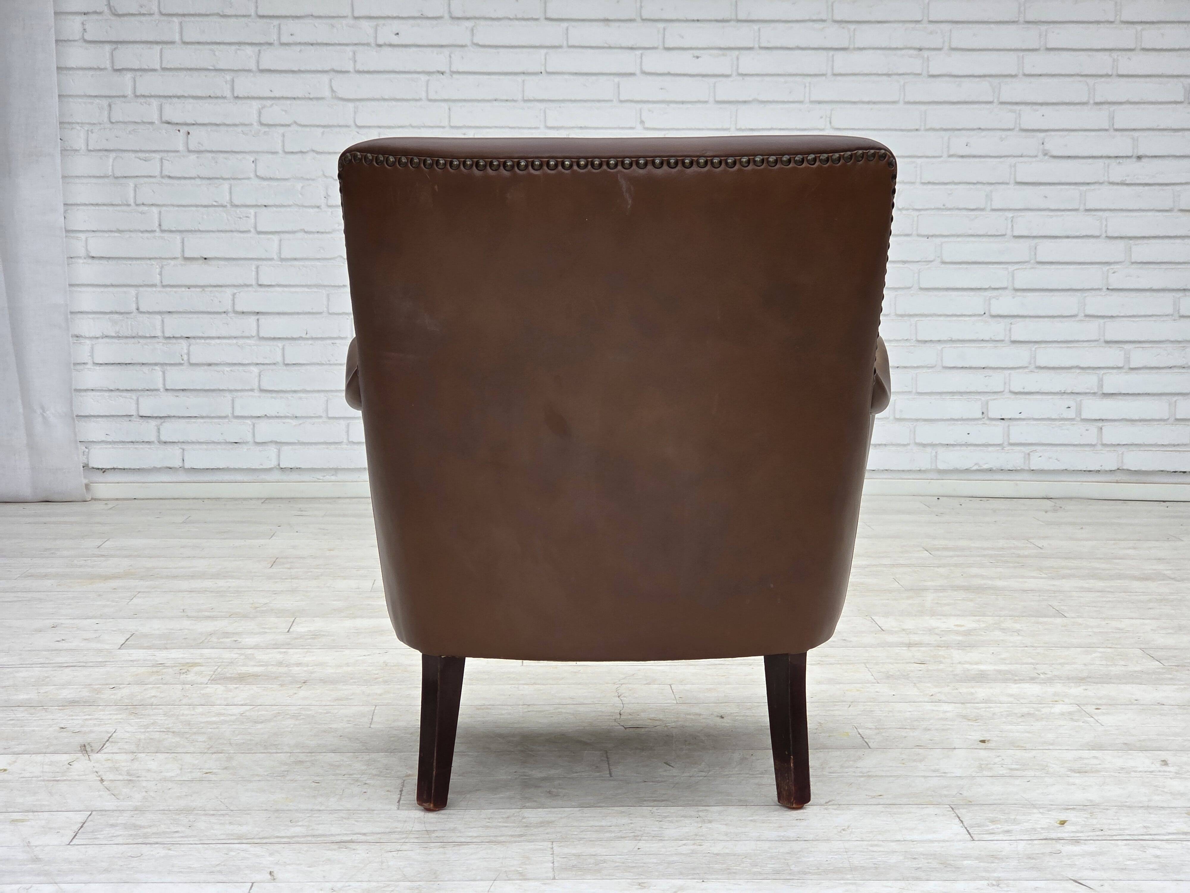 1960s, Danish armchair, furniture leather, ash wood legs.