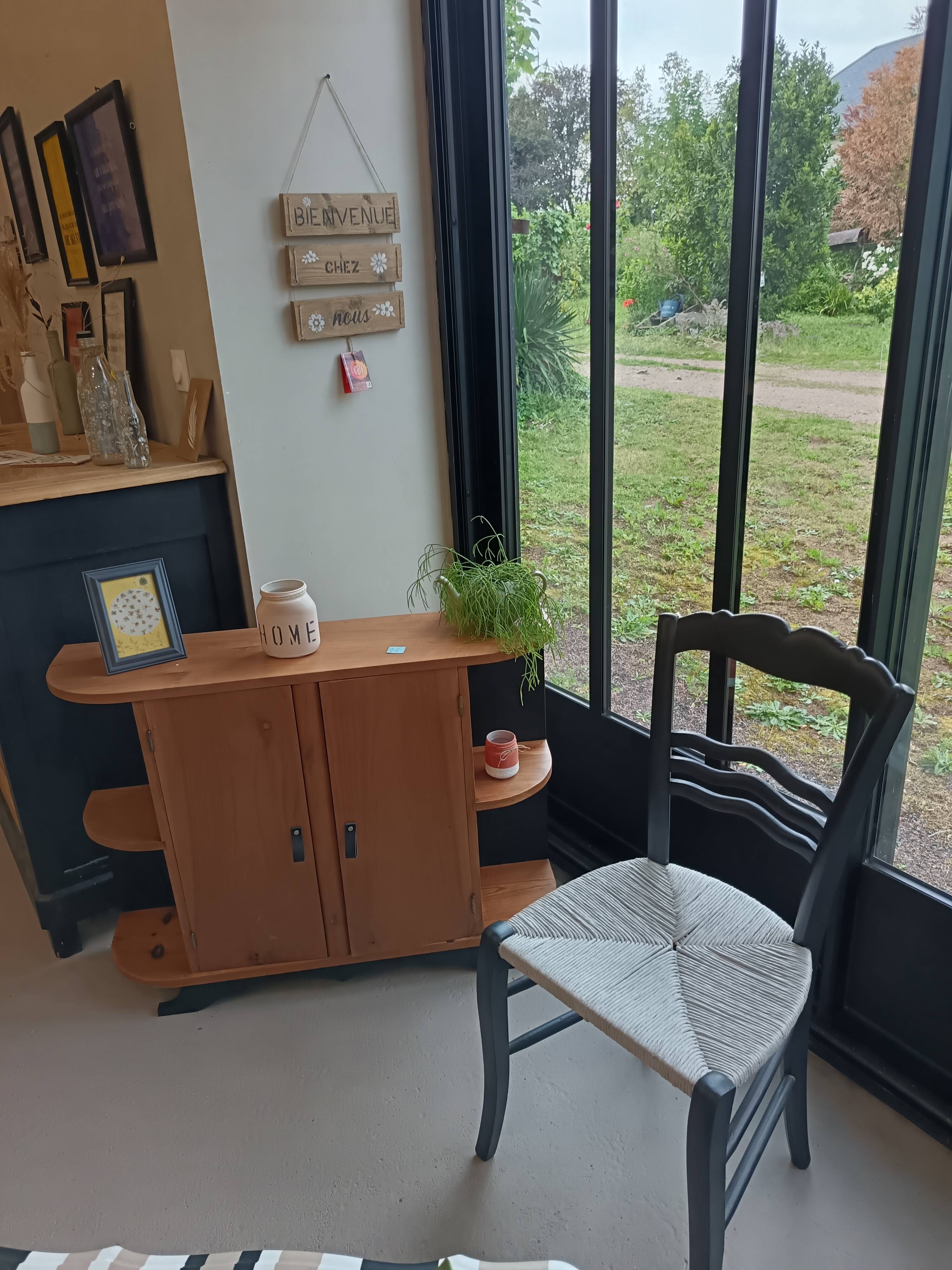 Small buffet or console in natural and black wood