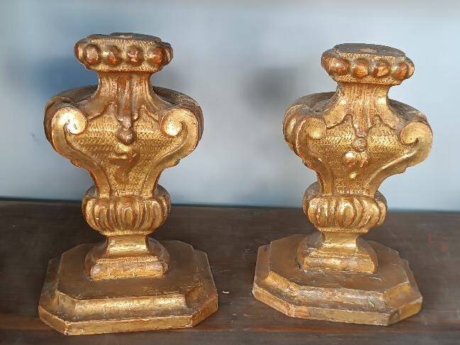 An antique pair of Louis XIV style paddle holders.