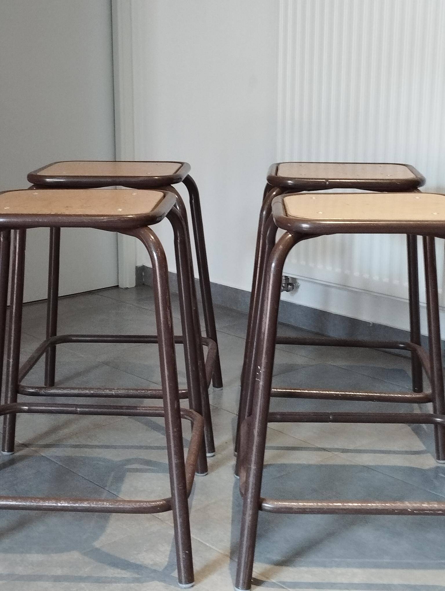 4 vintage stackable workshop stools from Mullca.