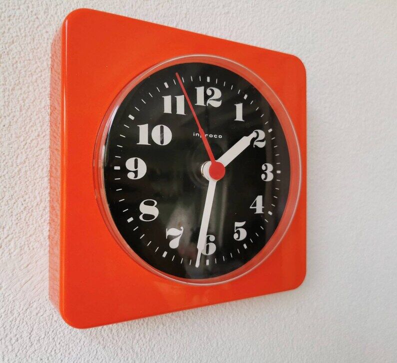 Vintage orange wall clock made of Inproco plastic, 1970