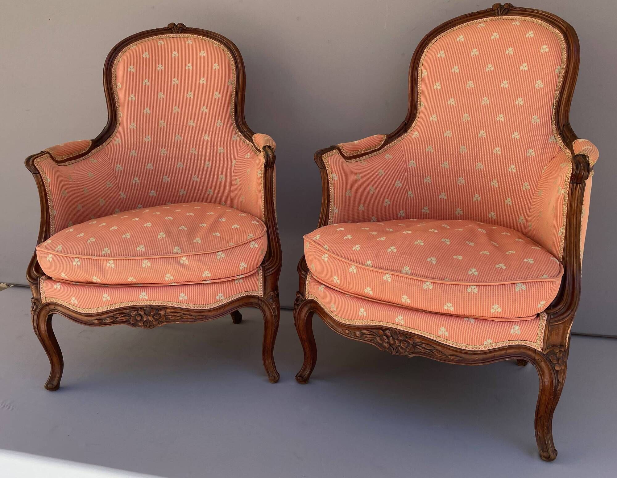 Pair of Louis XV period bergeres in walnut