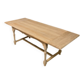 Solid oak farmhouse table with extensions.
